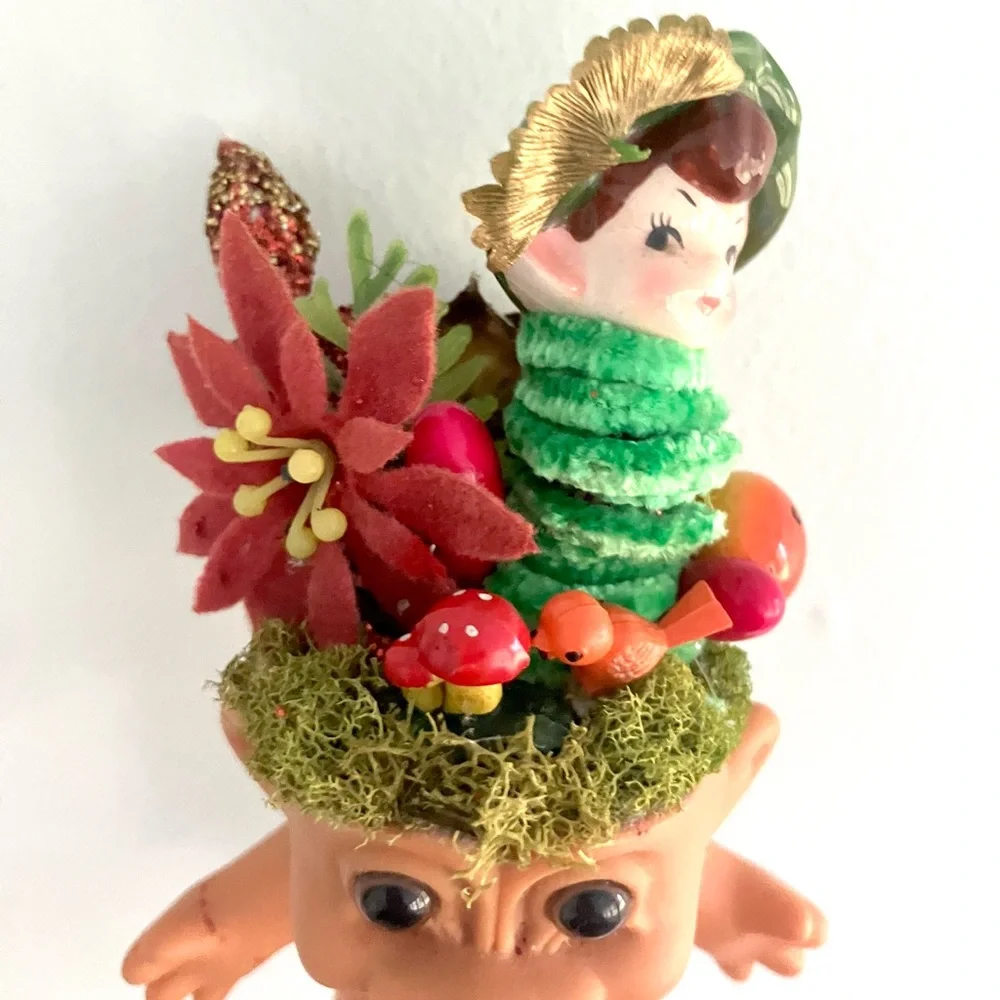 Vintage elf in a troll head handmade Christmas diorama vignette assemblage